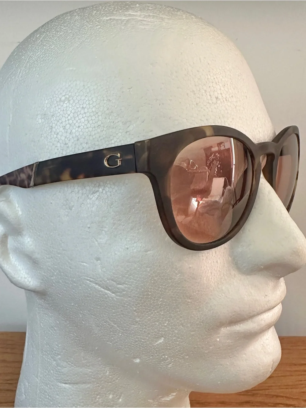 Guess sunglasses featuring